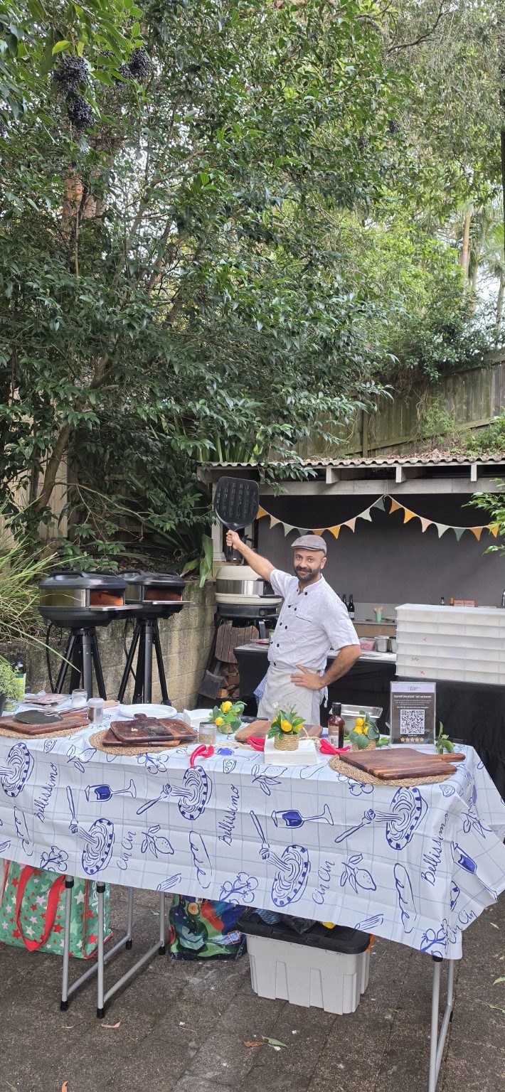 Azzurri pizzaiolo working twin mobile pizza ovens at a private République, Sydney event, fresh pizza cooked on-site Azzurri pizzaiolo working twin mobile pizza ovens at a private République, Sydney event, fresh pizza cooked on-site