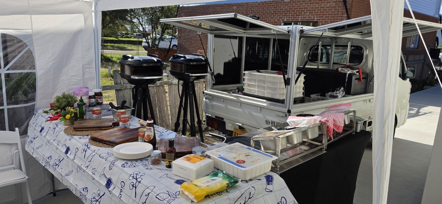 Azzurri mobile pizza catering van setup with twin mobile pizza ovens at a République, Sydney waterfront venue Azzurri mobile pizza catering van setup with twin mobile pizza ovens at a République, Sydney waterfront venue
